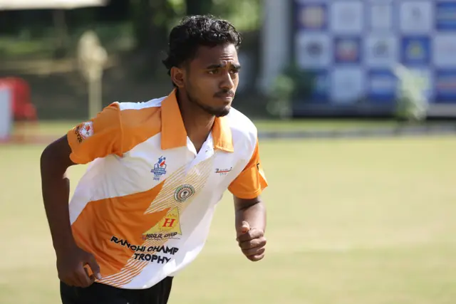 Bowler in full flight